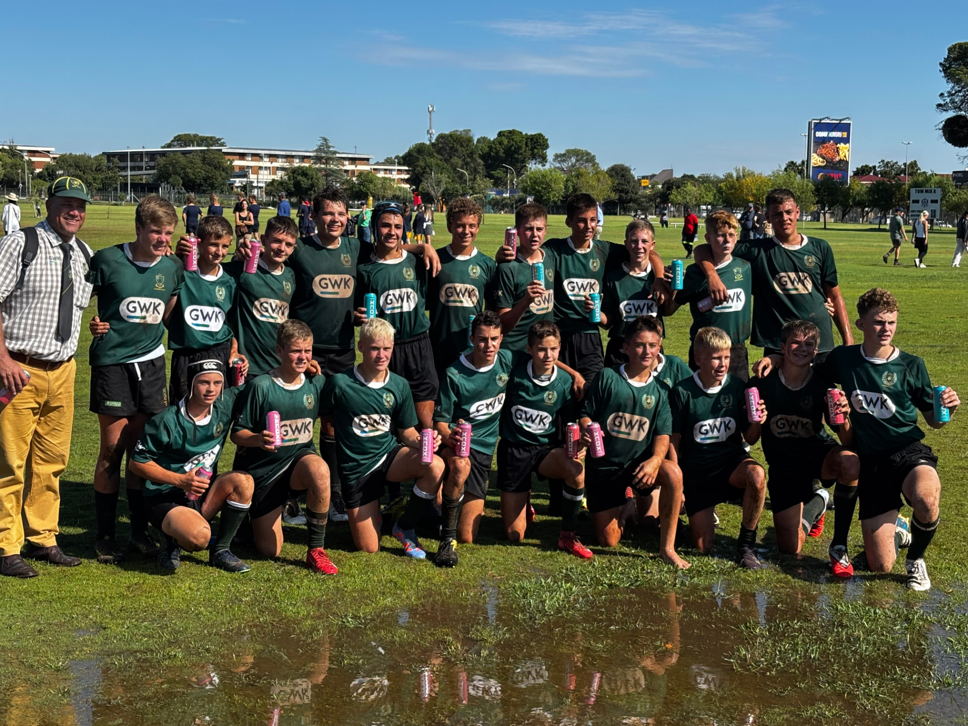 School sports team gathered on the field